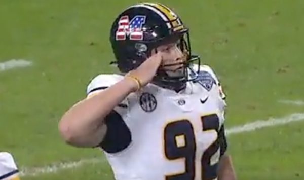 Missouri kicker salutes after a field goal