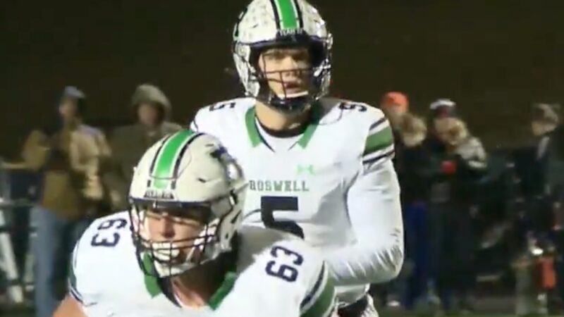 Robbie Roper drops back to pass