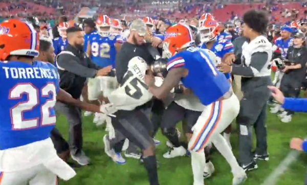 UCF and Florida players get into a postgame scrum
