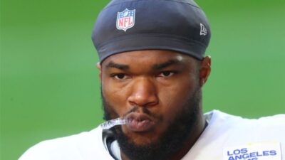 Cam Akers looking on
