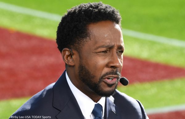 Desmond Howard with a headset on