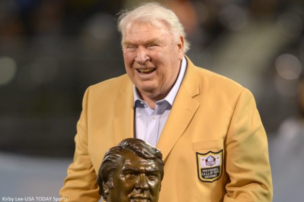 John Madden in a gold jacket