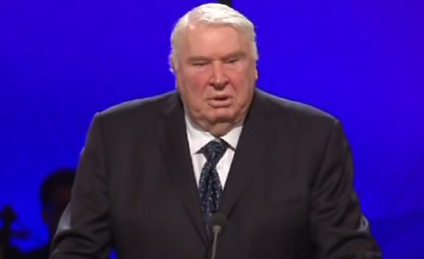 John Madden in a suit