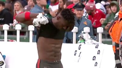 Antonio Brown strips off his uniform