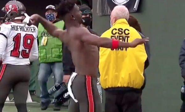 Antonio Brown throws his uniform into the stands