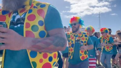 Jaguars fans wear clown costumes