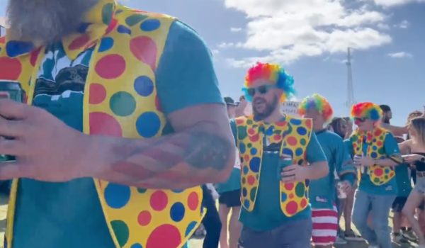 Jaguars fans wear clown costumes