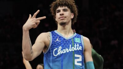 LaMelo Ball makes a hand gesture