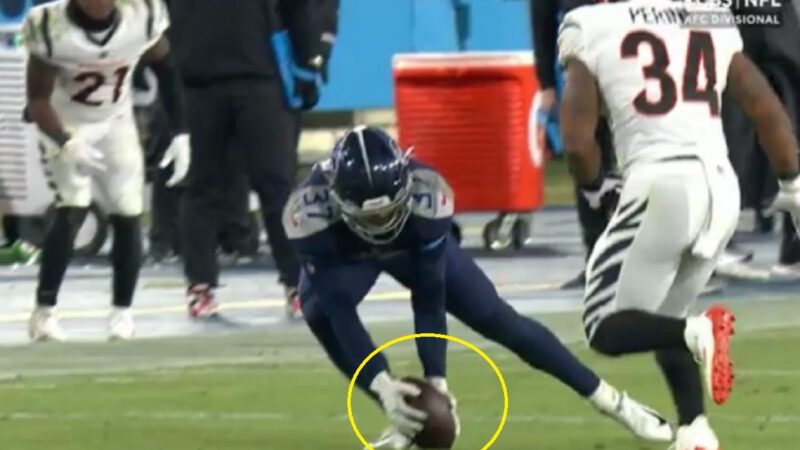 Amani Hooker holds the ball