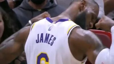 LeBron James flexing his muscles