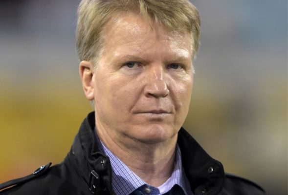 Phil Simms looking on