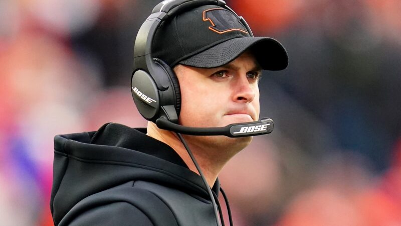 Zac Taylor wearing a headset