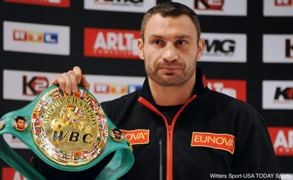 Vitali Klitschko poses with his belt