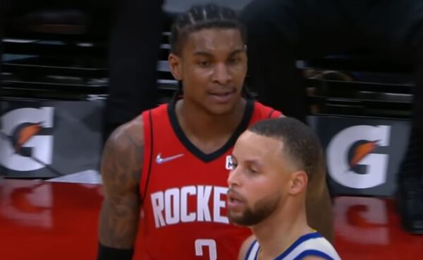 Kevin Porter Jr staring at Steph Curry