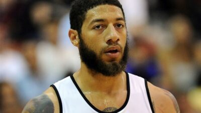 Royce White looking on