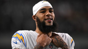 Keenan Allen watches from the sideline