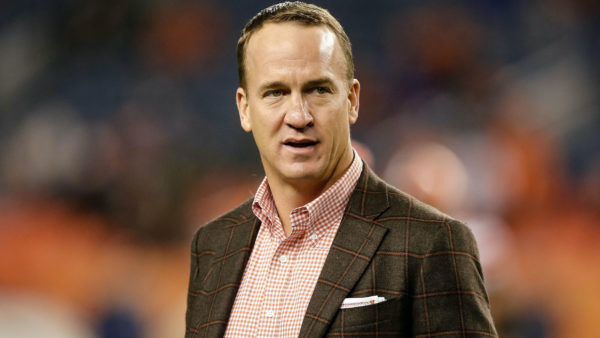 Peyton Manning in a suit