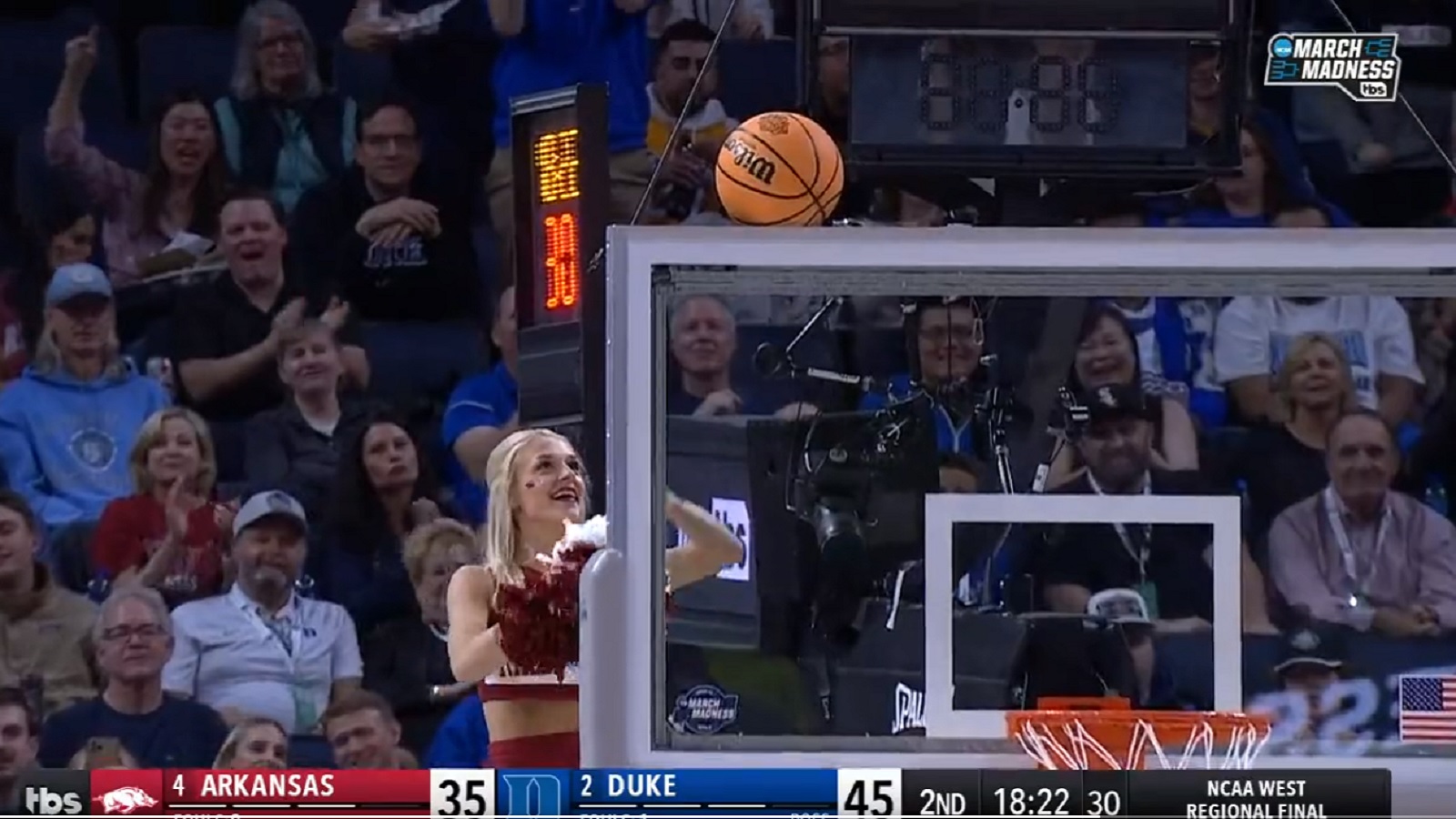 Arkansas cheerleader stands