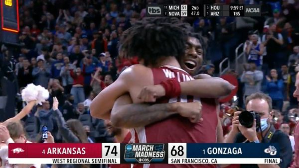 Arkansas players hugging