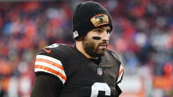 Baker Mayfield stands on the sideline