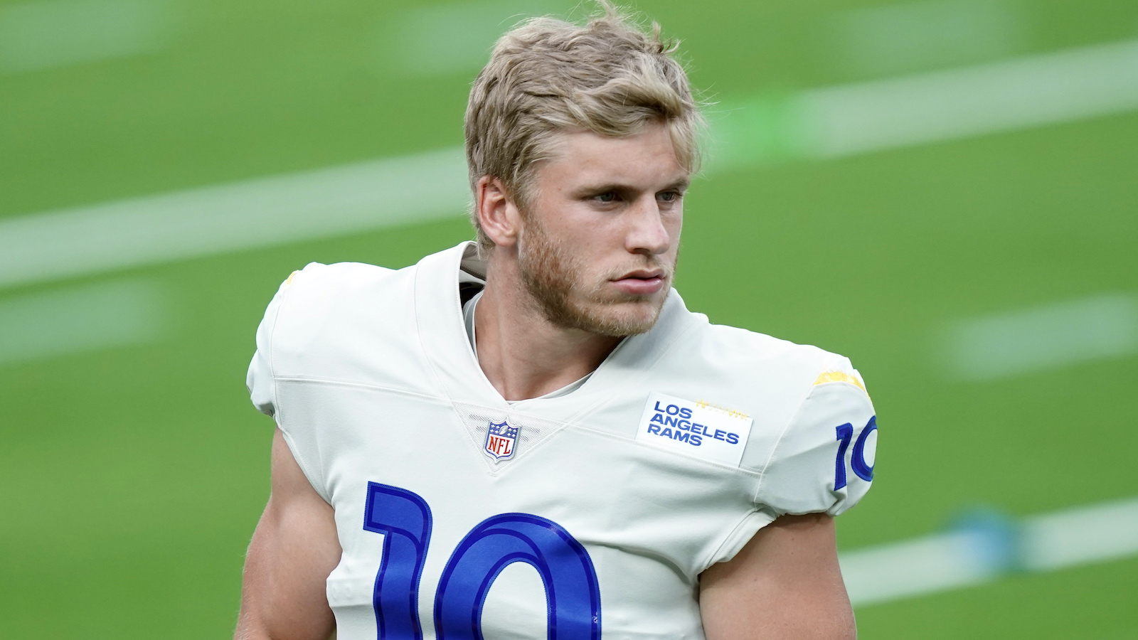 Cooper Kupp signed his extension wearing a Matthew Stafford jersey