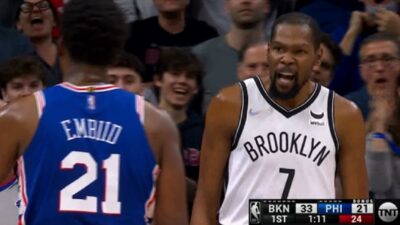 Kevin Durant talks to Joel Embiid