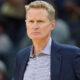 Steve Kerr looks on from the sideline