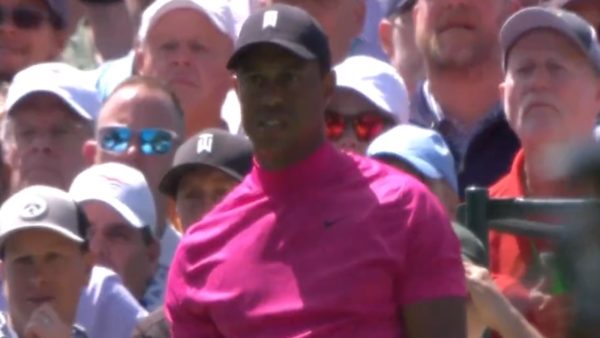 Tiger Woods poses after a shot