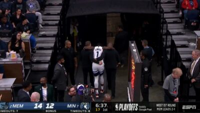 Anthony Edwards carried to the locker room