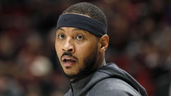 Carmelo Anthony looking on