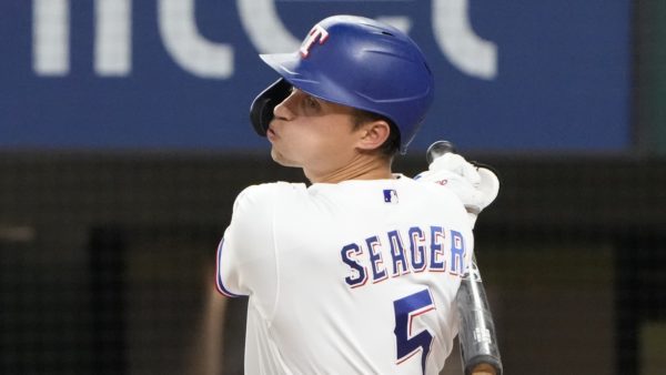Corey Seager swinging a bat