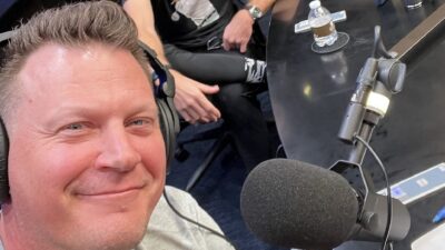 Geoff Blum with a headset on