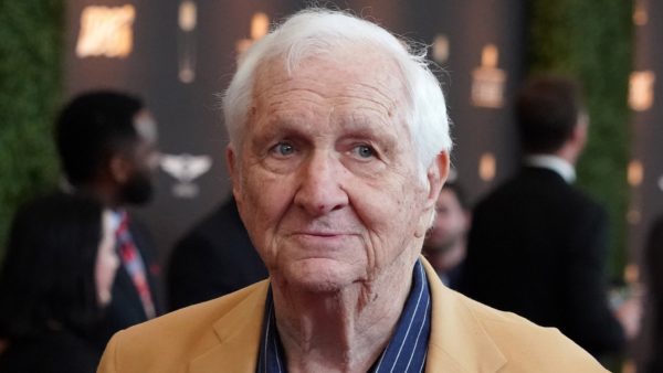 Gil Brandt in a yellow jacket