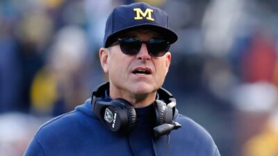 Jim Harbaugh wearing sunglasses