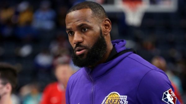 LeBron James in a purple Lakers sweater