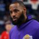 LeBron James in a purple Lakers sweater