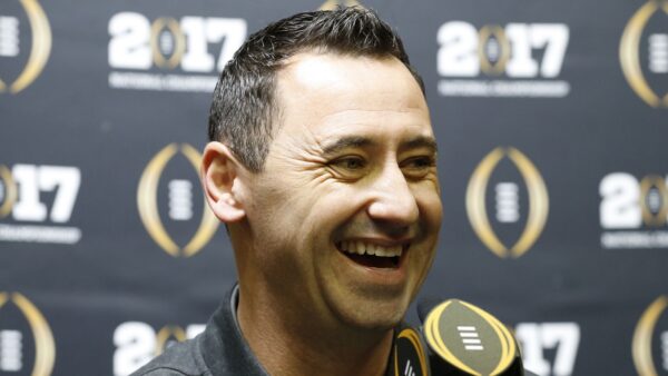 Steve Sarkisian smiles