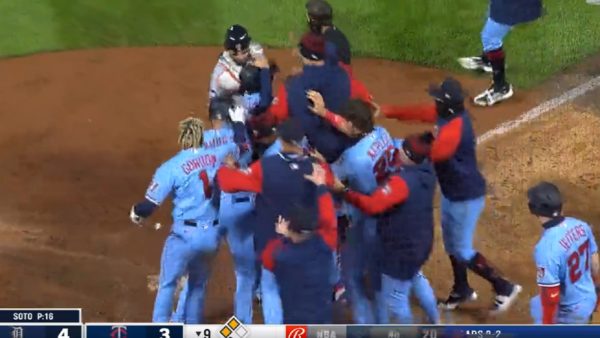 Twins celebrate a win