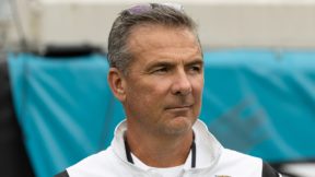 Urban Meyer looks on