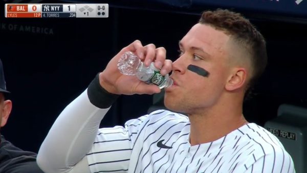 Aaron Judge holds a water bottle