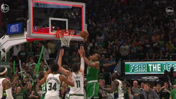 Al Horford tips a ball