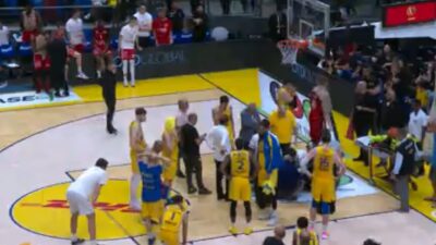 Ante Zizic surrounded by teammates