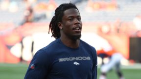Jerry Jeudy warming up while wearing a Broncos shirt