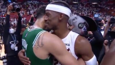 Jimmy Butler speaking to Jayson Tatum