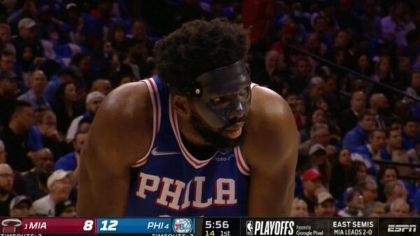 Joel Embiid in a black mask