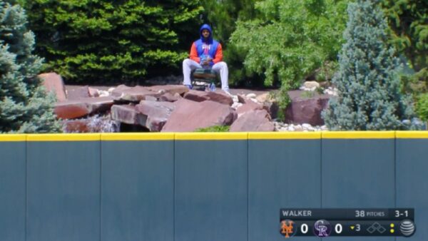 Joely Rodriguez sits in a chair