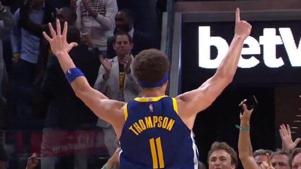Klay Thompson holds up six fingers