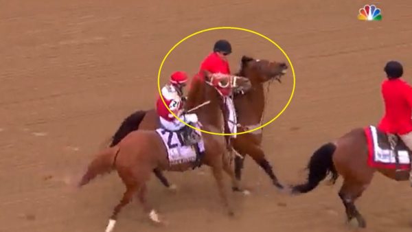 Rich Strike goes after a pony