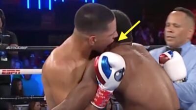 Edgar Berlanga attempts to bite an ear