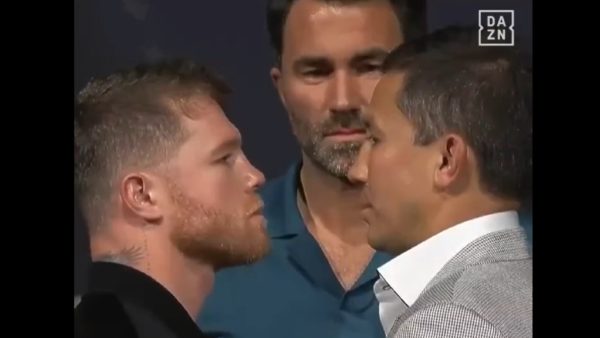 GGG and Canelo Alvarez look at each other